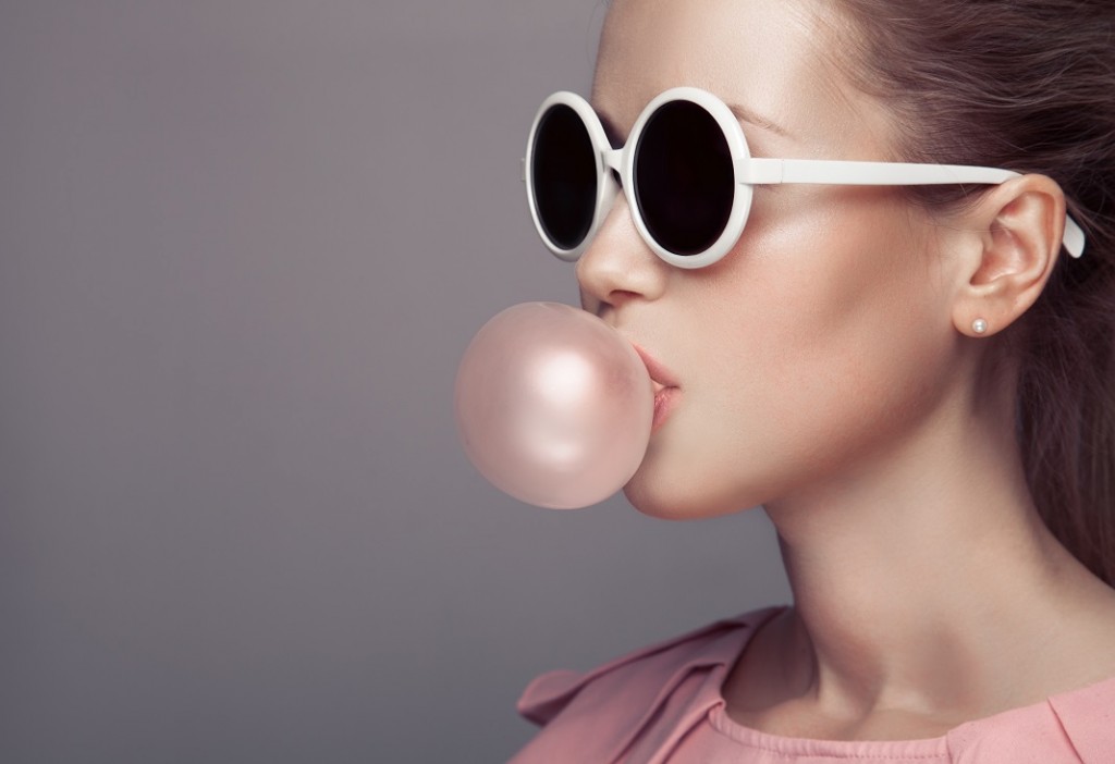 http://www.dreamstime.com/stock-image-beautiful-blonde-woman-blowing-bubble-gum-fashion-portrait-image49749431
